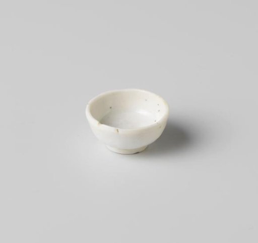 Cup with a cream colored glaze