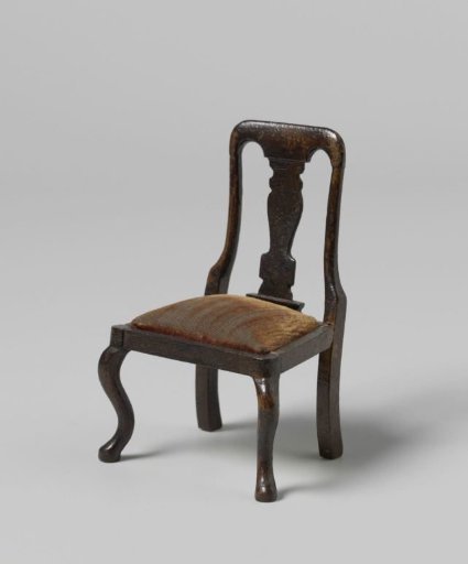 Chair, the back with a vase-shaped central panel, the seat with burgundy velvet