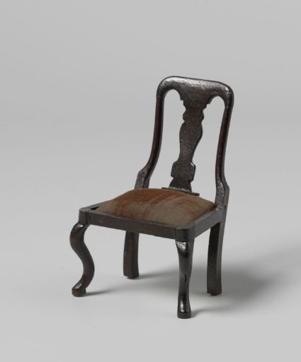 Chair, the back with a vase-shaped central panel, the seat with burgundy velvet