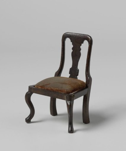 Chair, the back with a vase-shaped central panel, the seat with burgundy velvet