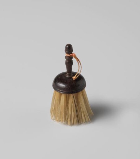 Brush with round head and profiled handle, with pink ribbon attached