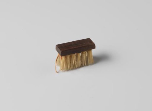 Broom with rectangular back
