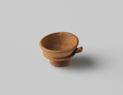 Steel bowl on a foot of turned wood