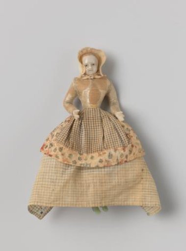 Doll representing a simple woman