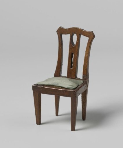 Chair with blue upholstery and straight back with openwork central stile