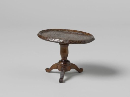 Table with oval top and round baluster stem