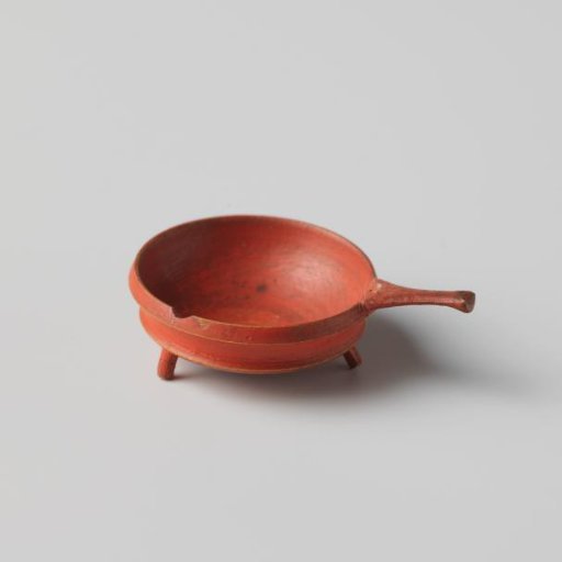 Three-legged steel pan, painted red