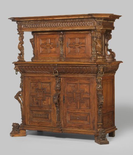 Buffet Cabinet, Divided into Upper and Lower Sections, with Corner Posts Placed Diagonally and Decorated with Lion Masks and Herms; on the Central Post a Satyr Mask and Caryatid; on the Corners Lion Masks with Copper Rings