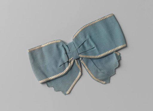 Ribbon of blue silk with white or faded orange edging