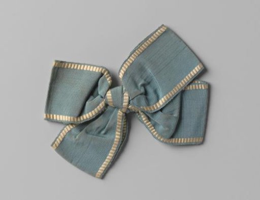 Ribbon of blue silk with white or faded orange edging