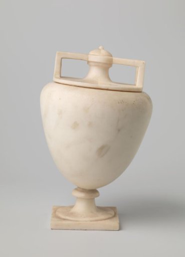 White marble vase on a grey-white marble pedestal