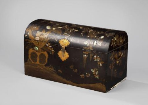 Chest on a pedestal, decorated in black with flowers of gold and mother-of-pearl