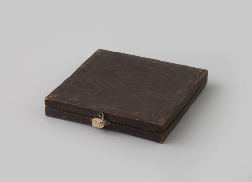 Case for a copper plate with the symbol of the evangelist John