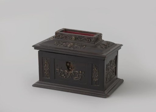 Long chest of ebony with silver ornaments