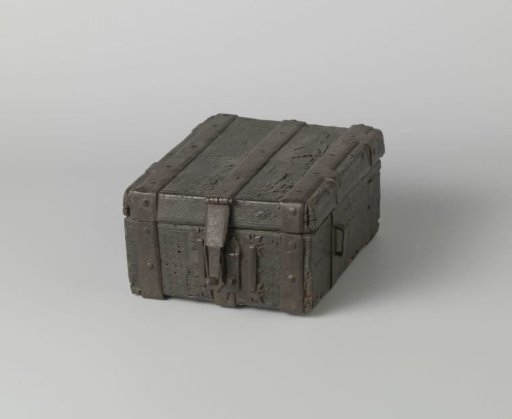 Trunk covered with leather, carved with a sun and further ornaments