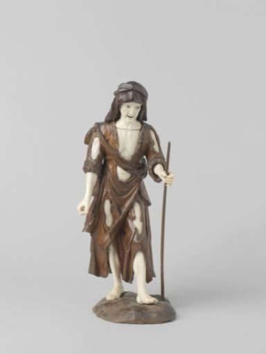 Begging figure with two sticks