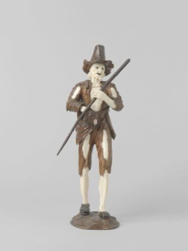 Begging figure with a stick