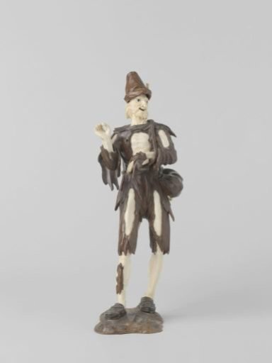 Begging figure with arm in a sling