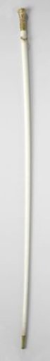 Walking stick of ivory with chased, gilded, openwork gold-colored ornaments on the knob and ring