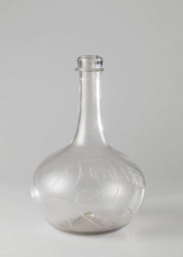 Bottle with the inscription: The wine reveals the Secret