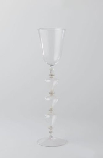 Chalice glass with a stem featuring hollow balusters and discs