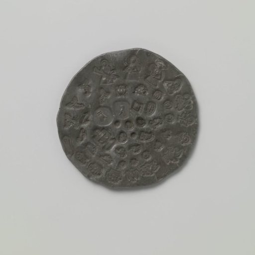 Tin plate with impressions of ornaments