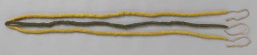 Part of horse harness decorations, namely four reins, consisting of two yellow and one green strands tied together with cords at the ends.