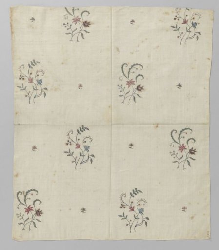 White cotton coverlet with colored silk embroidery