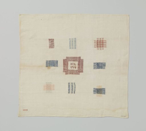 Patch of linen, with multicoloured embroidery
