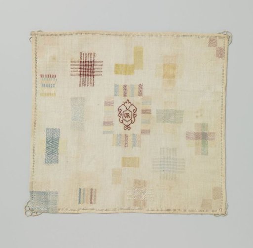 Patch of multicoloured silk on linen