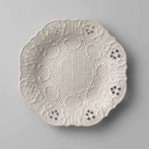 White stoneware plate with pierced border; Crouch ware
