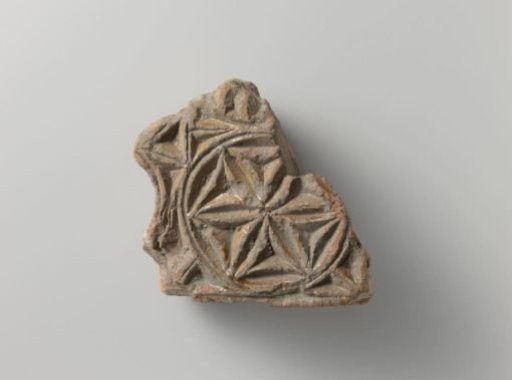 Architectural fragment, decorated with a recessed star shape