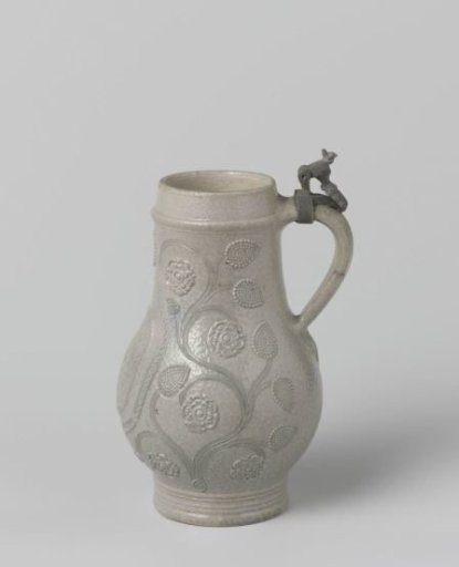 Jug with a portrait and floral scrolls
