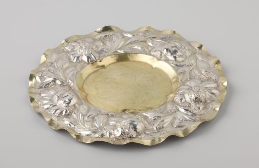 Silver Bowl, Round, Partially Gilded. On the Broad Rim with Wavy Outline Vines and Flowers in High Relief.