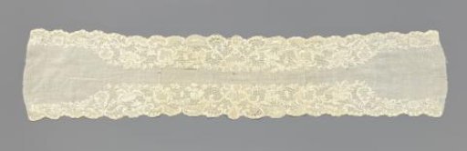 Strip of batiste with lace embroidery along the edges, featuring a row of flowers and a scalloped border of leaves beneath the flowers