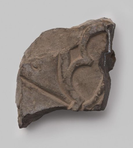 Fragment of a tombstone with sculpture