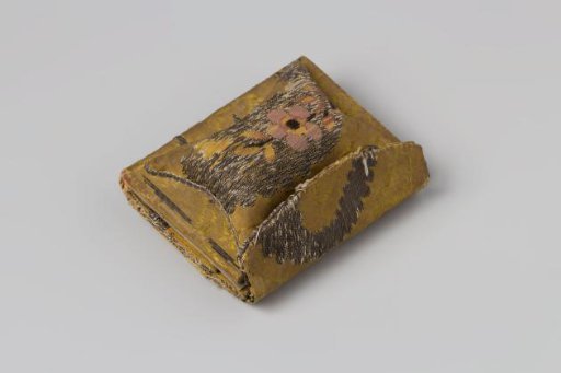 Embroidery case of silver brocade, also a pincushion and notebook, provided with a small mirror