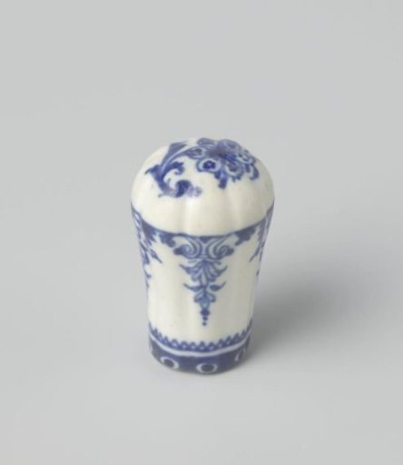 Cane knob with a flower and ornamental borders
