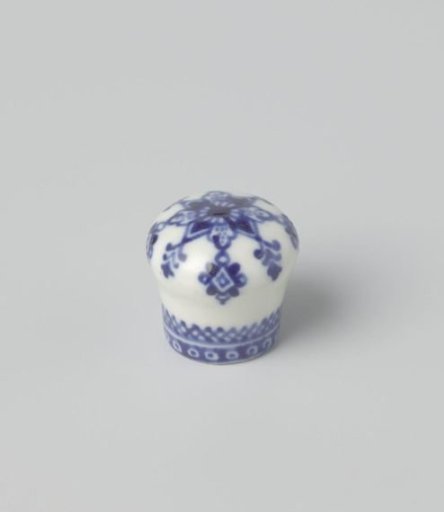 Cane knob with a roundel and ornamental borders