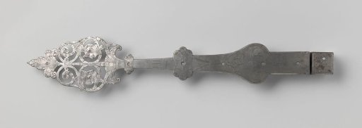 Door hinge of tin-plated iron, decorated with engravings and jester heads