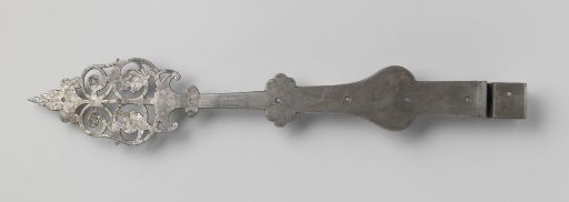 Door hinge of tin-plated iron, decorated with engravings and jester heads