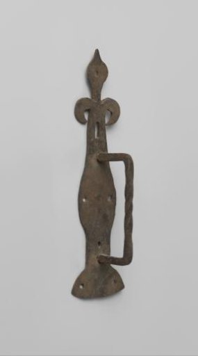 Door pull with lily as decoration