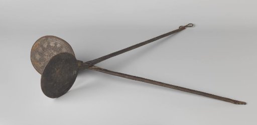 Cookie iron with inscription 1569