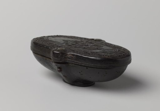 Wooden case, covered with leather, containing pressed ornaments and a coat of arms