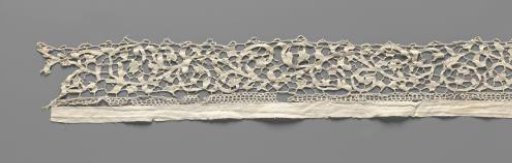 Antependium border of needle lace with star-shaped flowers