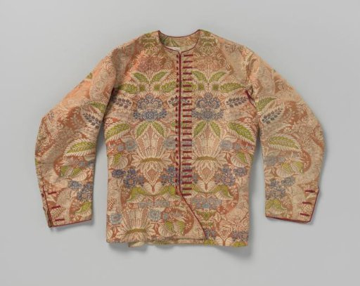 Jacket with long sleeves, armholes and 24 buttonholes of silk with woven floral motifs in apricot and cream, with floral motifs in blue, white, green, purple and pink