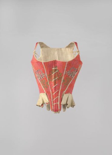 Corset covered with a cherry-red woolen fabric, decorated with polychrome flowers and white passement along five back seams and four front seams