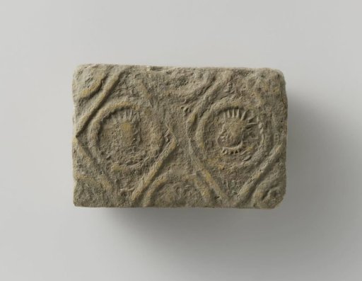 Fireplace of Baked Earth with a Diamond-Shaped Division