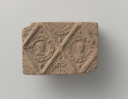 Fireplace of Baked Earth with a Diamond-Shaped Division