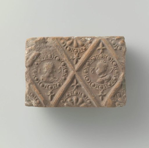 Fireplace of baked clay with diamond-shaped division